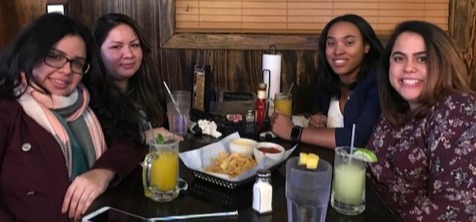 Kemely Weiss enjoying dinner with friends