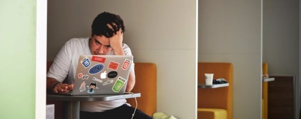 man-thinking-while-looking-at-laptop-screen-600x238.jpg